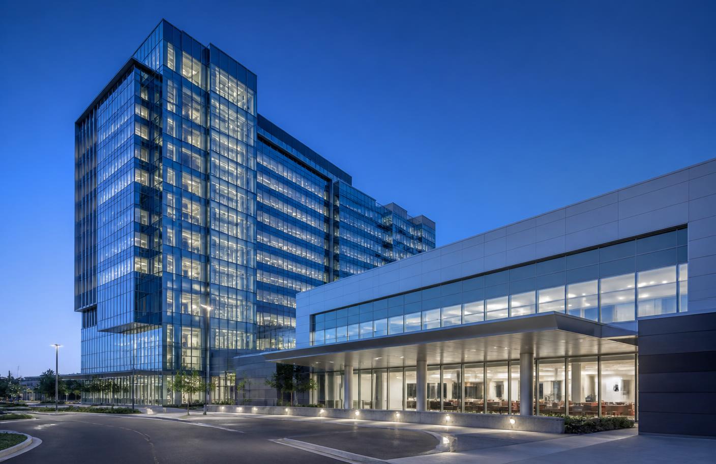 Modern commercial and healthcare buildings served by elevator systems